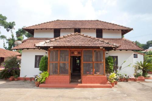 Gallery image of Sardar Bahadur's Heritage Bungalow Estate Stay in Napoklu