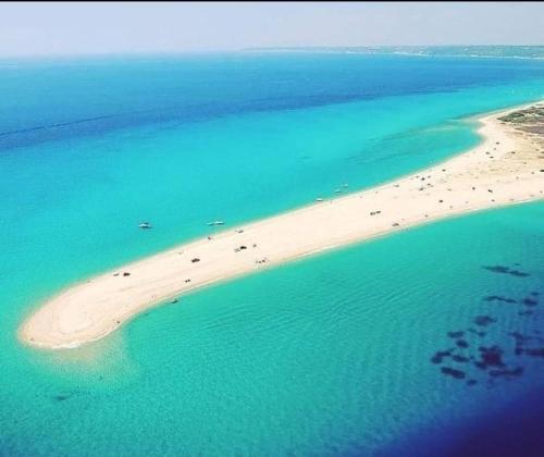 an aerial view of a beach in the ocean at Sunset Villas in Possidi