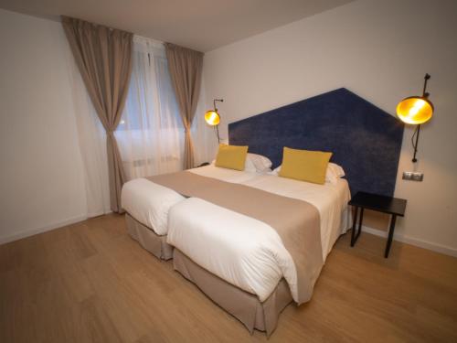 Hotel Roc Melerにあるベッド