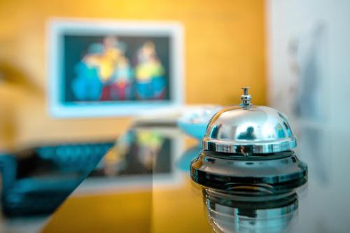 a close up of a metal object on a table at Hotel Bruman Salerno in Salerno