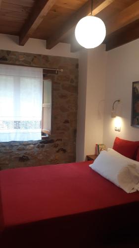 Ένα ή περισσότερα κρεβάτια σε δωμάτιο στο Casa Liron