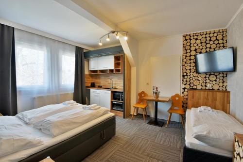 Katil atau katil-katil dalam bilik di Hotel Zum Gründle