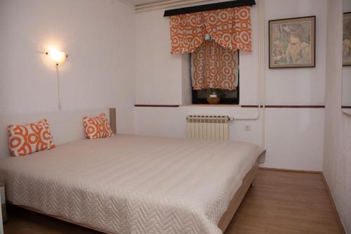 Posteľ alebo postele v izbe v ubytovaní Apartman Žagar