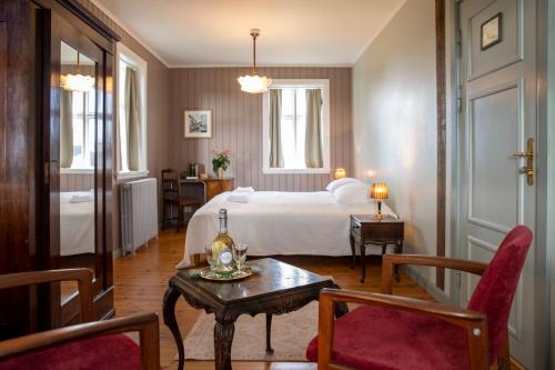 Postel nebo postele na pokoji v ubytování Hotel Flatey