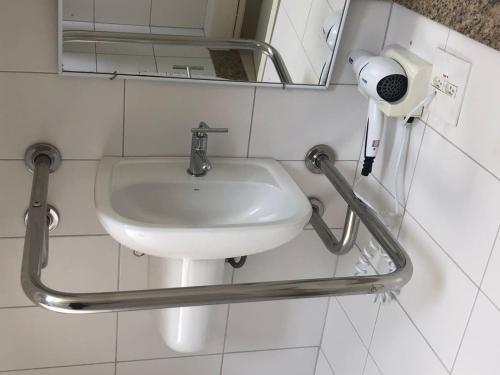 Un baño de Comfort Hotel Santos