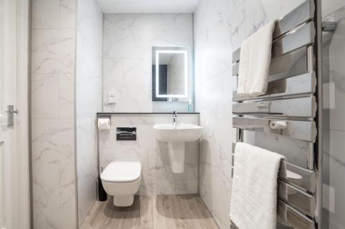 Vonios kambarys apgyvendinimo įstaigoje Wanslea Guest House
