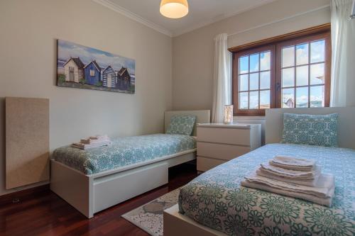 Postel nebo postele na pokoji v ubytování Casa Miha