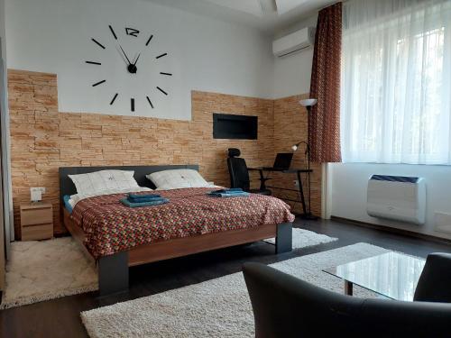 Postel nebo postele na pokoji v ubytování H20 Apartman Budapest Center