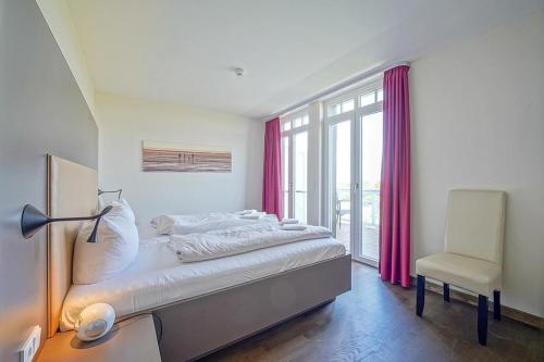 Postel nebo postele na pokoji v ubytování Resort Deichgraf Resort Deichgraf 27-21