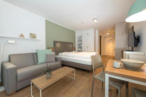 Giường trong phòng chung tại Apartmentvilla Anna See Apartmentvilla Anna See 1-06