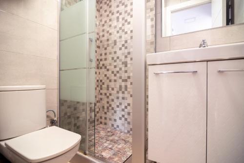 Un baño de Apartamento en 1º línea de playa