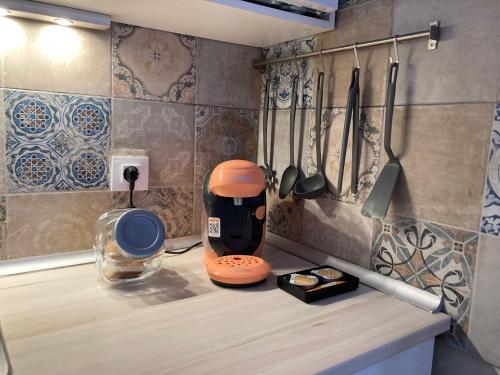 a kitchen counter with a blender and utensils at Estudio Playa Barbate in Barbate