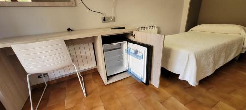 Una cama o camas en una habitación de Hotel Meson de L’Ainsa