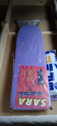 a box with a pair of skis in it at Apartman Cer in Banja Koviljača