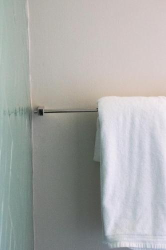 a towel hanging on the side of a refrigerator at Avodation in Walvis Bay