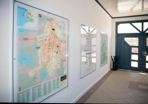 a large map is hanging on a wall at KRACHER Landhaus No 2 - inklusive Pool in Illmitz