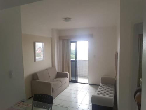 Χώρος καθιστικού στο Silva Hospedagem - Flat Biarrtiz
