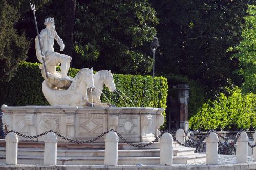 a statue of two horses in a fountain at Hotel Cristallo in Conegliano