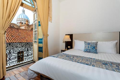Del Parque Hotel & Suitesにあるベッド