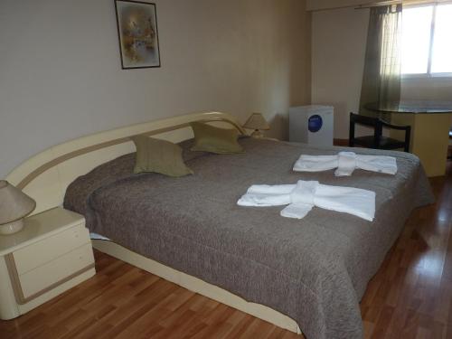 Postel nebo postele na pokoji v ubytování Hotel Aoma Buenos Aires