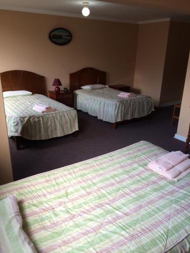Una cama o camas en una habitación de Posada Don Giorgio