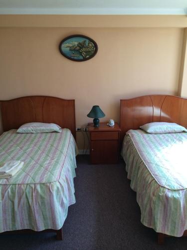 Una cama o camas en una habitación de Posada Don Giorgio