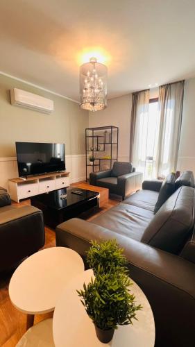 TV a/nebo společenská místnost v ubytování Sodic Westown Residence 2