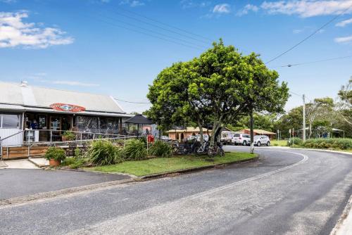a tree on the side of a street at Boronia Avenue 18 in Mylestom