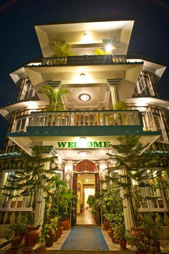 a building with plants on the side of it at Green Tara Hotel in Pokhara