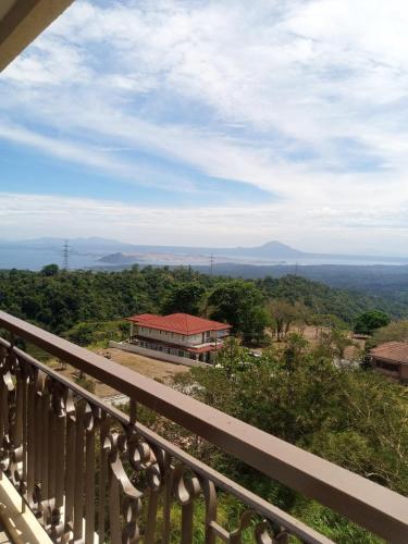 a view from the balcony of a house at Splendido Tagaytay Taal Lake Staycation Free Parking Netflix No Free Pool in Tagaytay
