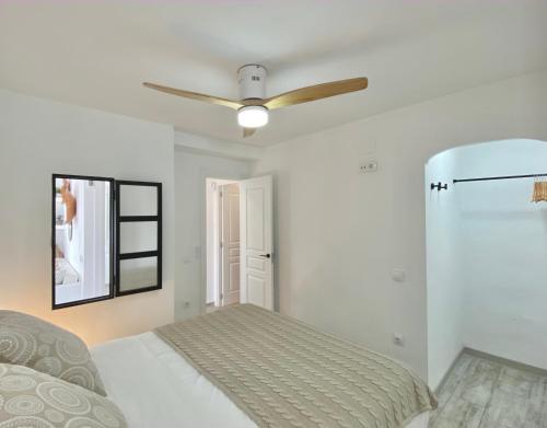 A bed or beds in a room at La Calma Sea Loft - Apartamento Boutique con Vistas