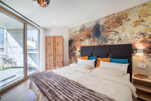 Postel nebo postele na pokoji v ubytování Adler Living Gartenwohnung