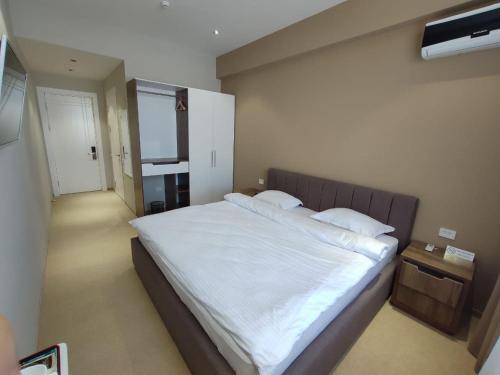 Katil atau katil-katil dalam bilik di PANA HOTEL