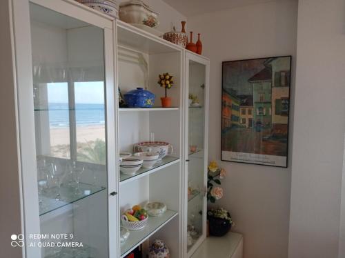 Η κουζίνα ή μικρή κουζίνα στο Xeracsol III Solo Familias Serviplaya!!!