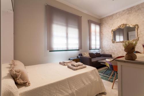 Posteľ alebo postele v izbe v ubytovaní Dream Apartments calle Zaragoza