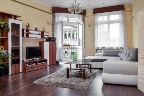 a living room filled with furniture and appliances at Basilica Apartments in Budapest