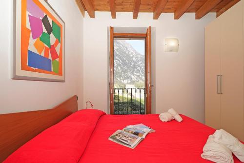 Postel nebo postele na pokoji v ubytování Casa Matisse - Gardagate