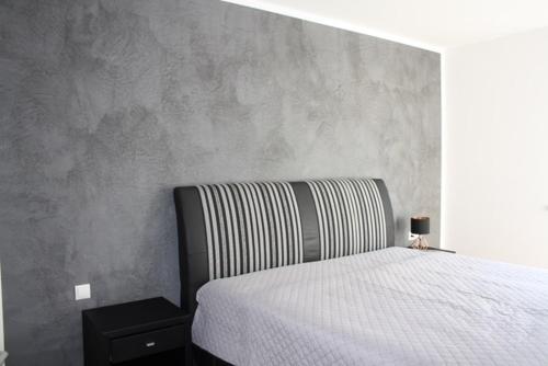 Posteľ alebo postele v izbe v ubytovaní Exklusive Penthousewohnung mit Tesla-Wallbox in Innsbruck
