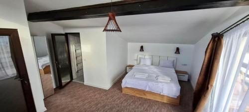 Giường trong phòng chung tại Cabana Mar’amu