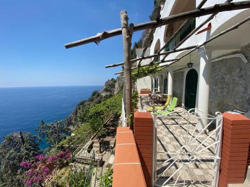 a house with a view of the ocean at Villa Carmela in Conca dei Marini