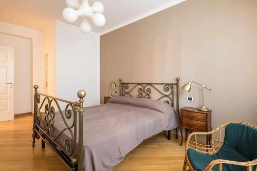 En eller flere senge i et værelse på Casa Selleri