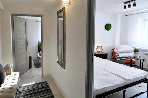 Ένα ή περισσότερα κρεβάτια σε δωμάτιο στο Apartament Spytkowice - ENERGYLANDIA KRAKÓW OŚWIĘCIM WADOWICE