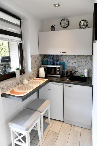 Η κουζίνα ή μικρή κουζίνα στο Apartament Spytkowice - ENERGYLANDIA KRAKÓW OŚWIĘCIM WADOWICE