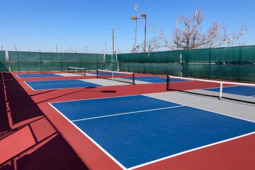 a group of tennis courts on a tennis court at Isle of View in Mexico Beach
