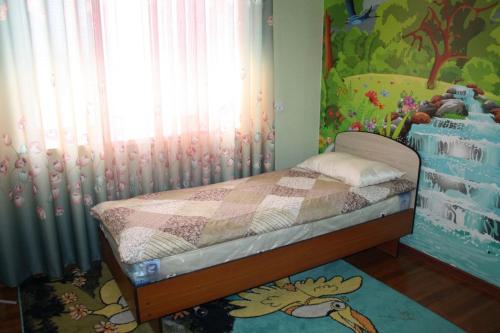 Postel nebo postele na pokoji v ubytování Guest House Shirin