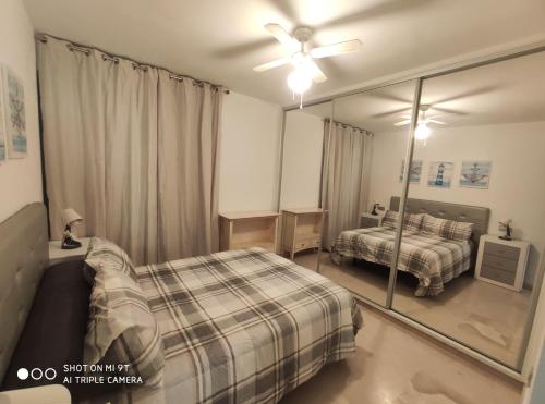 Posteľ alebo postele v izbe v ubytovaní Apartamento Castillo Bajo