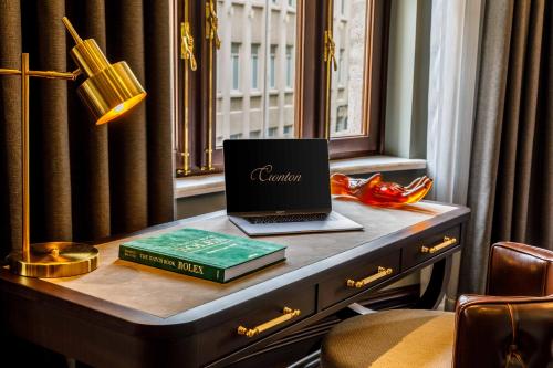 a desk with a laptop computer on top of it at Cronton Design Hotel in Istanbul
