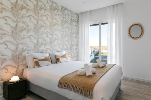 Ένα ή περισσότερα κρεβάτια σε δωμάτιο στο Sunny Penthouse