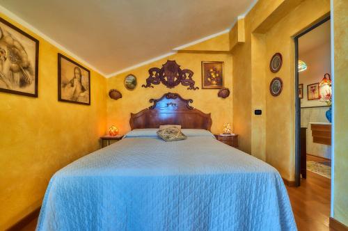 Giường trong phòng chung tại B&B - FORESTERIA - Frontelago Lake Como