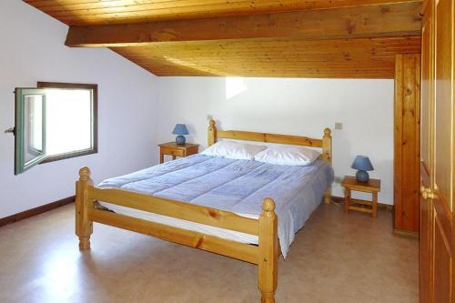 เตียงในห้องที่ Holiday house near beach, St Denis-d'Oléron